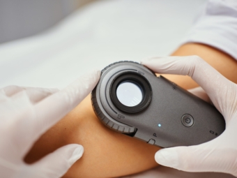 A dermatologist examines the skin. High quality photo